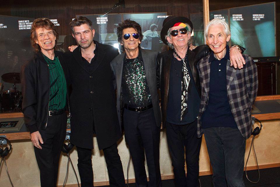 Alex Emanuel to his new mates Mick, Ron, Keith and Charlie at Exhibitionism at London's Saatchi Gallery