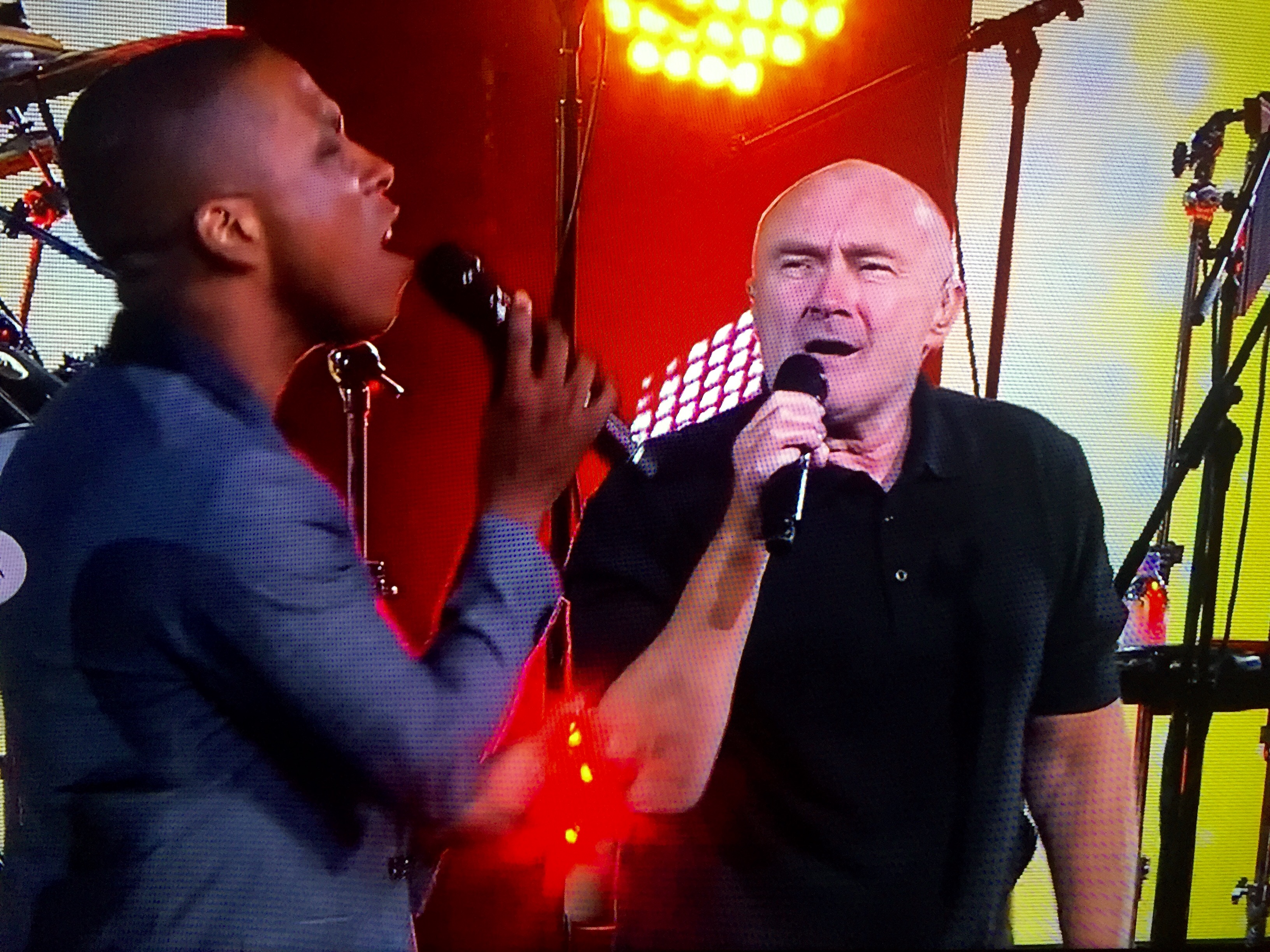 Phil Collins with Tony Award-winning actor (for Hamilton) Leslie Odom Jr. at the opening night ceremony at the US Open, August 29, 2016